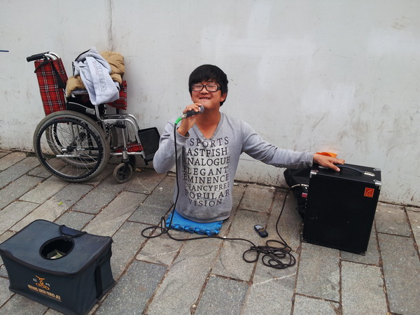 铜奖 盛文洁 身残志坚.jpg